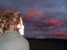 alison admires the red tinted sky
